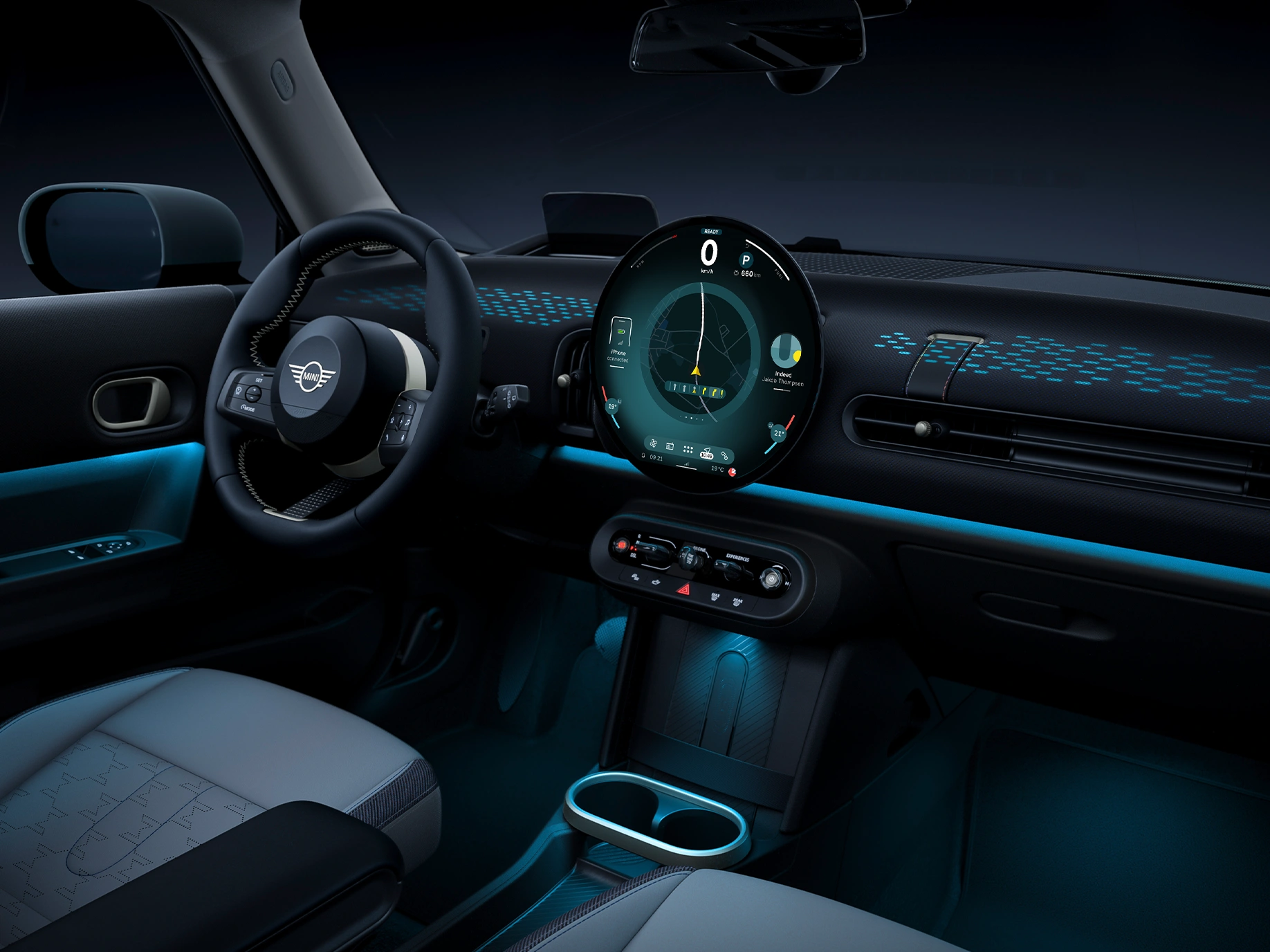 Άποψη του εσωτερικού του MINI Cooper με ατμοσφαιρικό φωτισμό σε μπλε χρώμα.